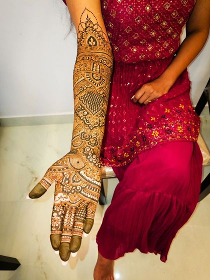 A single arm shot of a beautiful Pakistani-inspired bridal design.