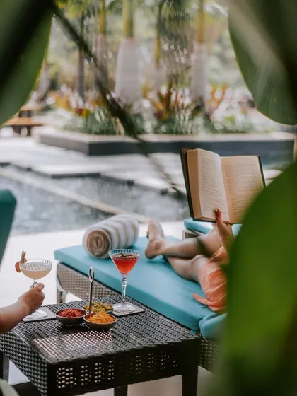 Lose yourself in a good book and the luxury of doing nothing at all. Our poolside cabanas offer a private haven for you to unwind with a refreshing cocktail and light bites, letting the day drift by peacefully.