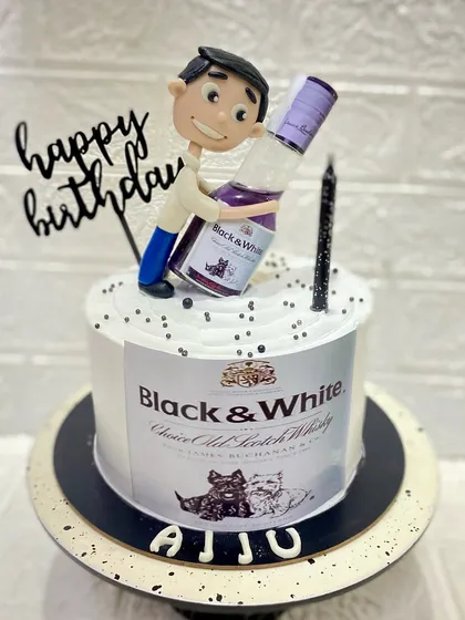 Another shot of our creative Black & White whisky themed cake.