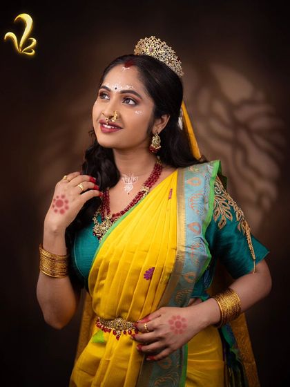A portrait from our Chandrakantha concept shoot. The styling focuses on regal elements like the crown and rich fabrics to portray the goddess as an alpha female, a powerful symbol for the modern woman entering marriage.