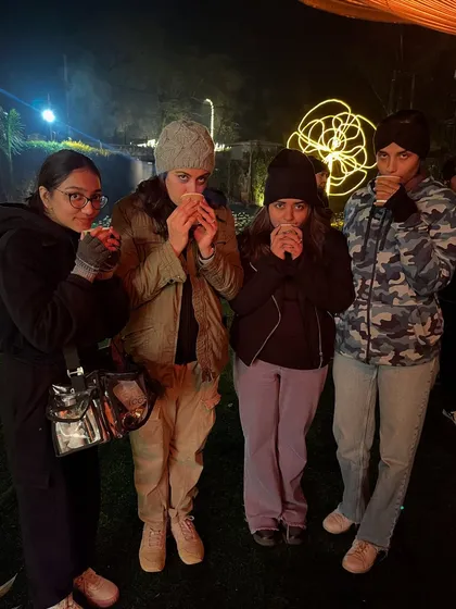 Keeping warm with some chai during a cold night shoot for 'Nadaaniyan'. The glamour of filmmaking often involves battling the elements together as a team.