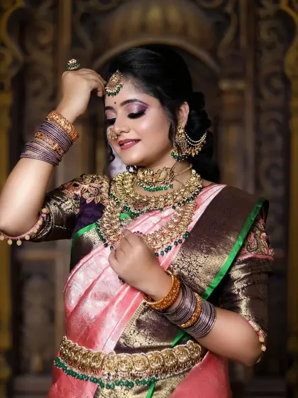 This series features a model in a pink and brown saree, wearing a heavy bridal set with green stone accents, showcasing a complete and regal look.