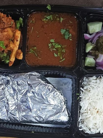 A tasty thali with arbi masala and rajma. The combination of the crispy taro root and the creamy kidney bean curry is simply delicious.