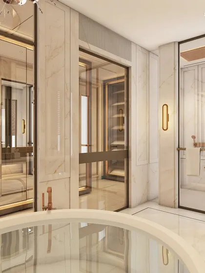 A closer look at the master bathroom, where a freestanding circular tub is the centerpiece. The space is adorned with palatial stones, glass partitions, and custom closets, seamlessly integrating rich jewel tones with a palette of pastel and neutral shades.