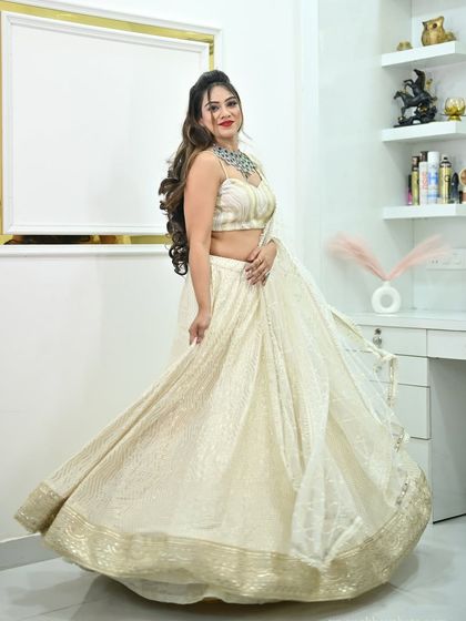 Another dynamic twirl, showing the full volume and shimmer of the sequined lehenga.