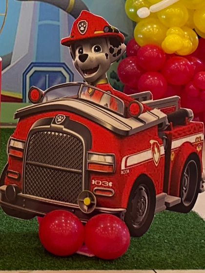 A life-sized cutout of Marshall from Paw Patrol, adding a fun and recognizable element for the kids at the party.