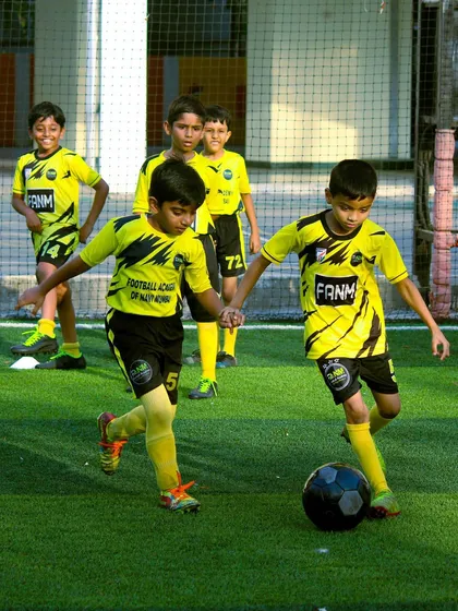Two players challenge for the ball, showcasing the intensity of our practice sessions.