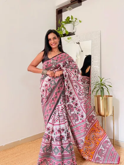 I love the elephant motif on the border of this printed saree. It adds a touch of traditional art to a modern workwear saree.