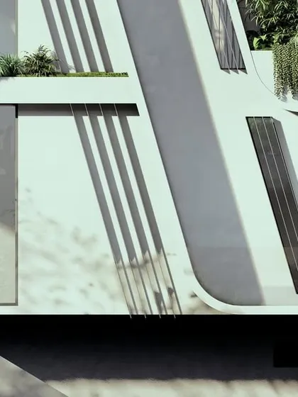 A detail of the inclined facade of our Moira Homes project. The angled reveals are not just a stylistic choice; they are designed to hold inbuilt planters, extending the landscape vertically and integrating greenery into the building's form.
