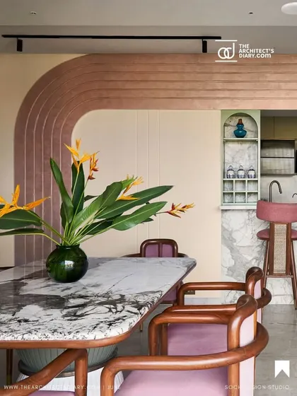 The Architect's Diary highlighted the unique architectural details like the curved archway and breakfast bar.