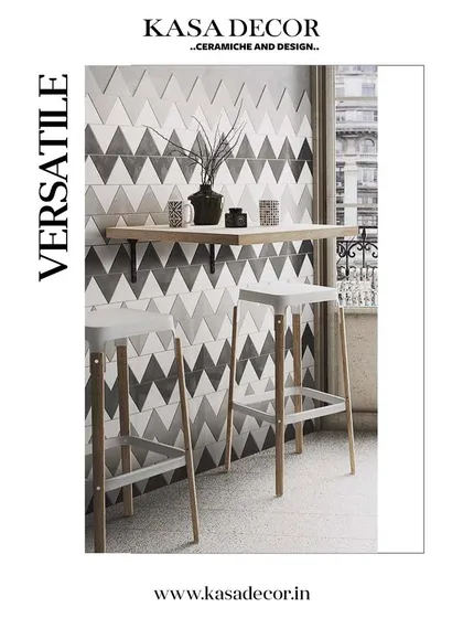 Versatile chevron-patterned tiles in a monochrome palette. Used here as a backsplash in a breakfast nook, they create a modern and graphic statement.