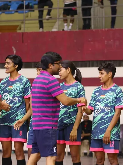 A moment of sportsmanship as our management greets the finalists of the Women's Futsal League.