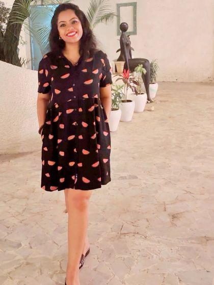 A smiling, happy shot in the fun watermelon-print dress. Your clothes should make you feel good.
