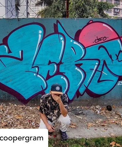 A finished throw-up in a different style, with a character peeking out from the letters. Even in simpler forms, I like to add a touch of personality.