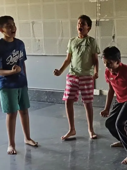 Three boys letting out a roar! A theatre exercise to help children explore their voice and express powerful emotions in a safe space.