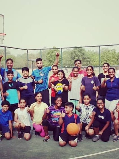 The smiles and thumbs-ups say it all. This group photo from our 2018 summer coaching camp captures the energy and camaraderie that defines our academy's community.