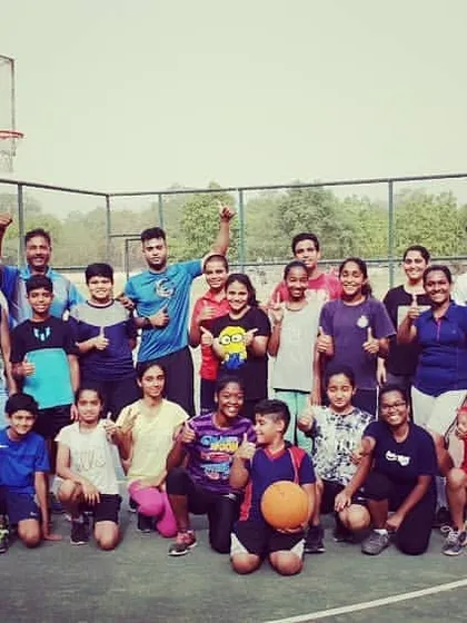 The smiles and thumbs-ups say it all. This group photo from our 2018 summer coaching camp captures the energy and camaraderie that defines our academy's community.