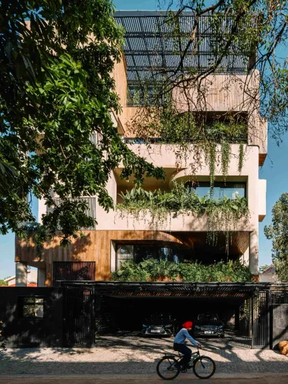 For this Bengaluru home, we challenged the shrinking of green spaces in dense urban areas. The structure unfolds as a series of staggered volumes, with gardens and trees woven into every level, creating a private sanctuary that breathes and extends the city's garden identity.