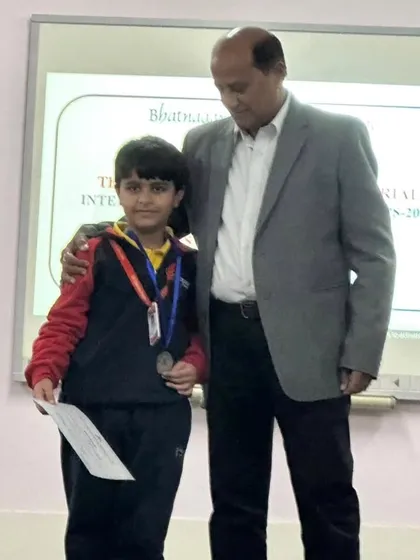 8-year-old Raajvansh Kumar receives his Silver medal in 10m Air Rifle at the Inter-School Shooting Championship. We nurture talent from a very young age.