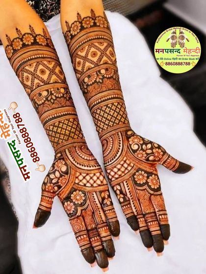 A classic full-hand bridal design with dense, intricate patterns. The floral and geometric motifs are perfectly balanced for a timeless look.