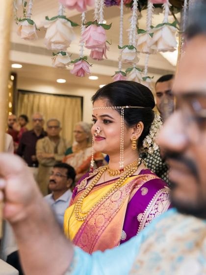A beautiful view of the bride making her entrance, seen from the groom's perspective.