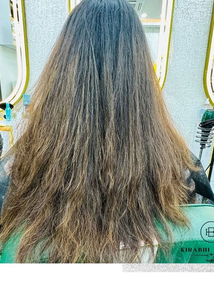 The "before" shot of a major color transformation. This client's hair was ready for a change, and we were excited to give her a fresh new look.