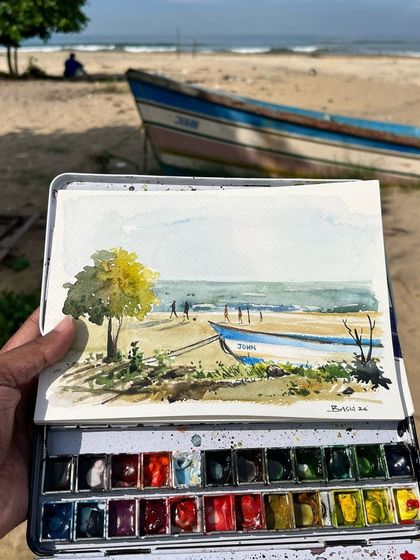 A plein air watercolor painting from my hometown beach. I love capturing the simple beauty of the boats and the sea.