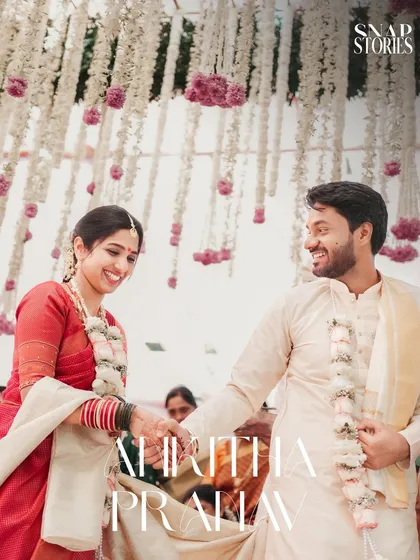 The couple shares a happy, candid moment during their wedding ceremony. We focus on capturing the genuine smiles and interactions that tell your love story.
