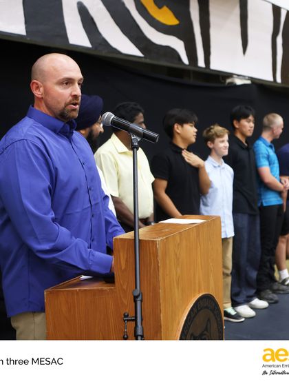 The coach of the boys' baseball team speaks at the MESAC awards ceremony. Our coaches are dedicated mentors who guide our student-athletes in their growth both on and off the field.