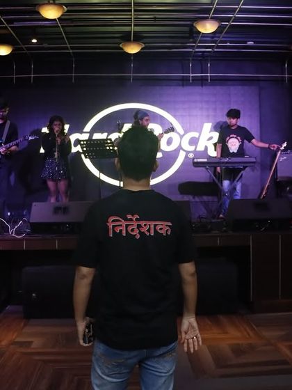 A shot of our 'Nirdeshak' (Director) watching the band he put together perform on the Hard Rock Cafe stage. A proud moment for all of us.