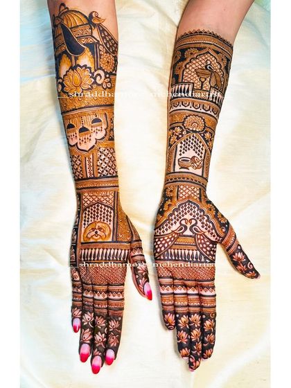 This design is rich with symbolism, featuring a bride's face, a wedding palanquin, and a dog portrait. The use of bold lines and fine details creates a stunning effect.