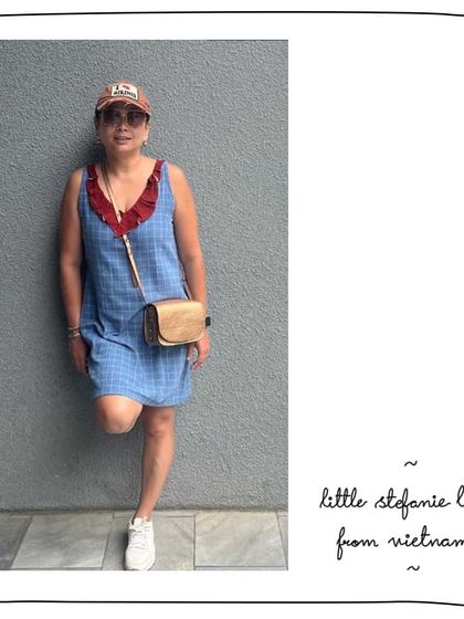 Pallavi exploring Vietnam with her Little Stefanie sling in Bronze. It's the perfect compact travel companion for hands-free exploring.