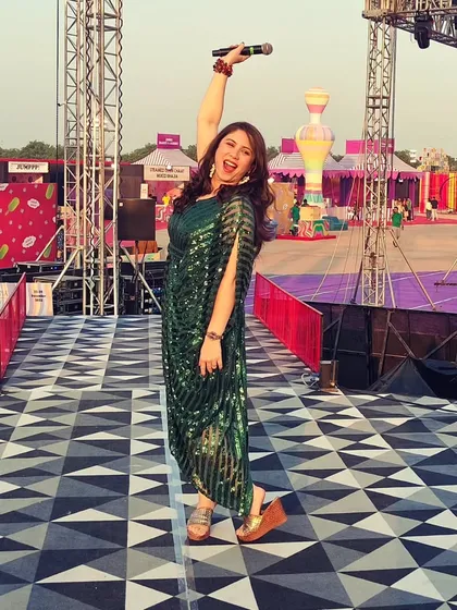 A full-length shot showing my excitement and energy before taking the stage at the Christmas carnival.