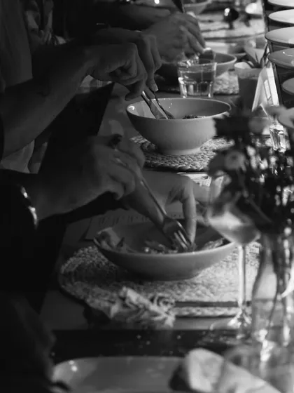 The intimate, candlelit setting of 'The Wonder Years' dinner, where guests enjoyed a meal steeped in friendship and nostalgia.
