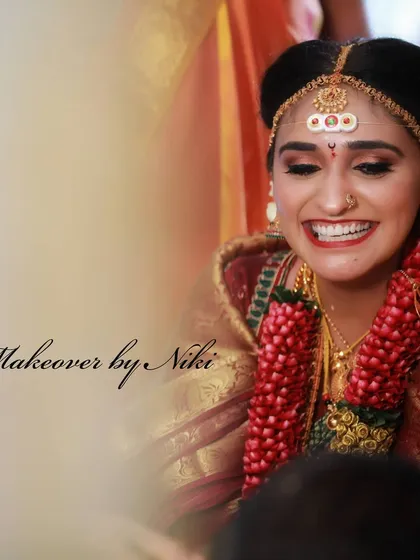 A candid moment of pure happiness. Pooja's makeup is designed to be waterproof and long-lasting, ensuring she looks perfect through all the emotional moments of the ceremony.