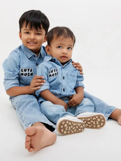 A sweet moment between two brothers. Even in a studio setting, I look for the natural interactions that show their unique bond.
