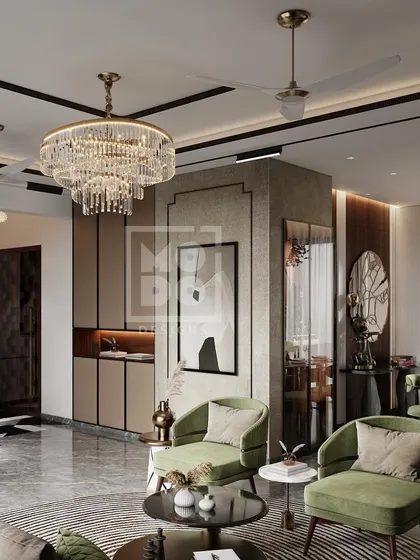 Here, we paired elegant olive green armchairs with a grand crystal chandelier and a geometric rug. The result is a sophisticated living area that feels both grand and welcoming, perfect for hosting guests.