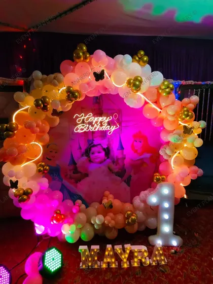 A beautiful view of the illuminated princess birthday setup.