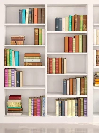 An organized bookshelf is a joy to look at. If your shelves are overflowing, storing less-used books, photo albums, and media can help you achieve a clean, curated look in your home.