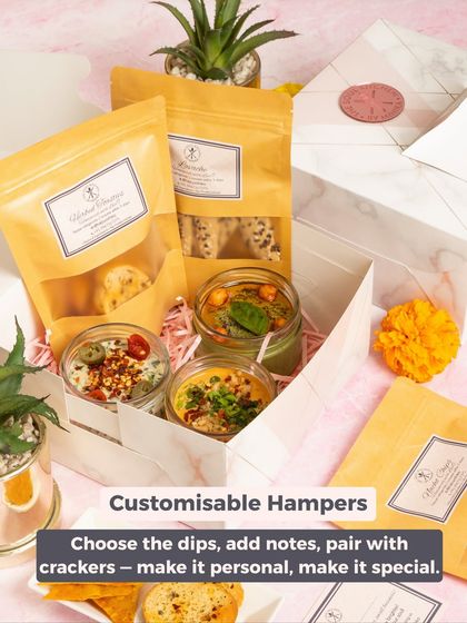 Customisation is key. This image highlights how you can create a personal and special gift by choosing your favourite dips, pairing them with crackers, and adding a note.