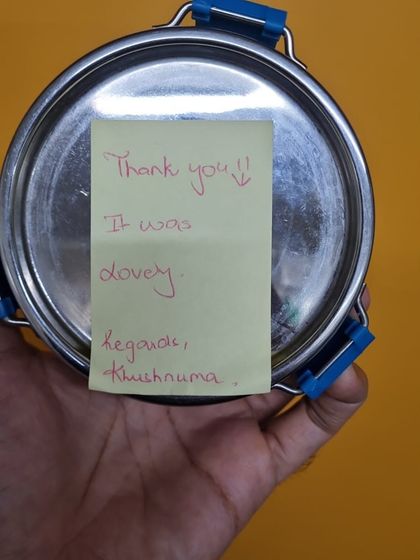 A close-up of the handwritten note that made our hustle feel absolutely worth it. "Thank you!! It was lovely." Simple words with a huge impact.