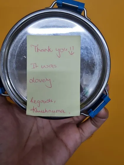 A close-up of the handwritten note that made our hustle feel absolutely worth it. "Thank you!! It was lovely." Simple words with a huge impact.