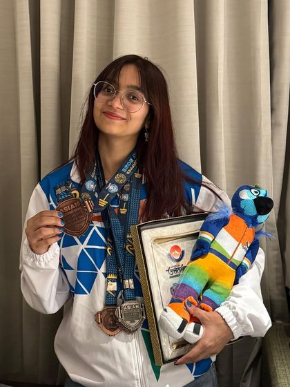 Priyanshi earning a bronze medal at her first international competition, the IPF Asian Junior Championship. She finished her junior career on a high note with a 122.5kg squat, 75kg bench, and 130kg deadlift.