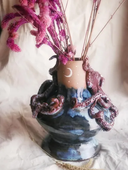 I get very attached to some pieces, and this octopus vase is one of them. I love the challenge of sculpting something so detailed and full of life onto a wheel-thrown form.