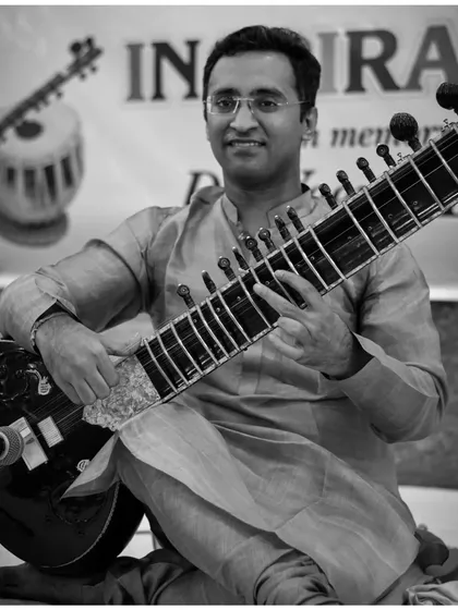 A black and white portrait from the Meerut performance.