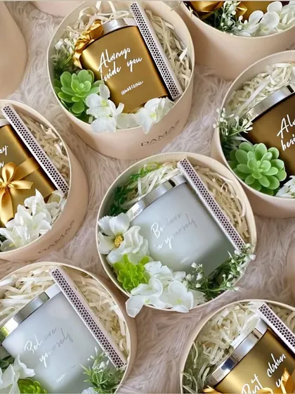 The ultimate bridesmaid gift. These round boxes contain gorgeous custom candles and can be personalized for your special friends.