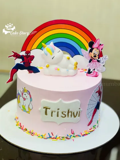 Three themes in one cake. This design combines a sleeping unicorn, Spiderman, and Minnie Mouse under a rainbow, perfect for a child who loves them all.