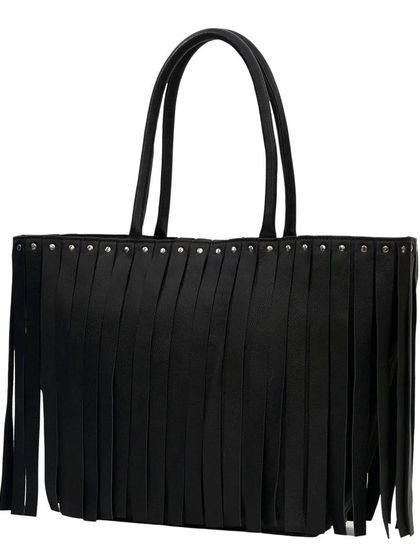 The Tassel Tango Tote in classic black. This bag is the perfect combination of work and play, with its professional shape and fun tassel details.