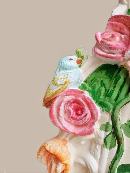 Here is another detail shot from the decorative frame, showing the texture of the paint on the roses and the little blue bird. Each brushstroke adds to the unique, handmade quality of the piece.