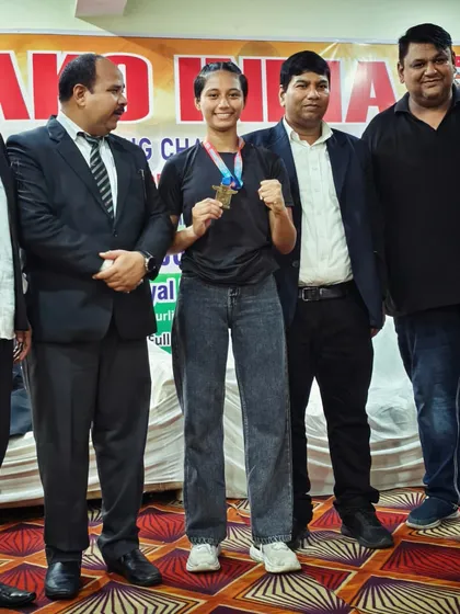Another one of our strong female competitors after her win. The hard work in the gym pays off in the ring.